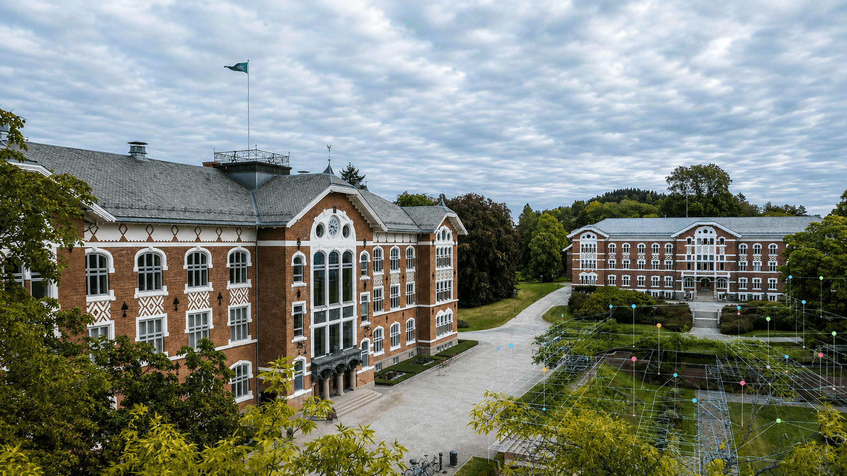 Urbygningen and Tårnbygningen at NMBU with a subtle digital data layer over the campus